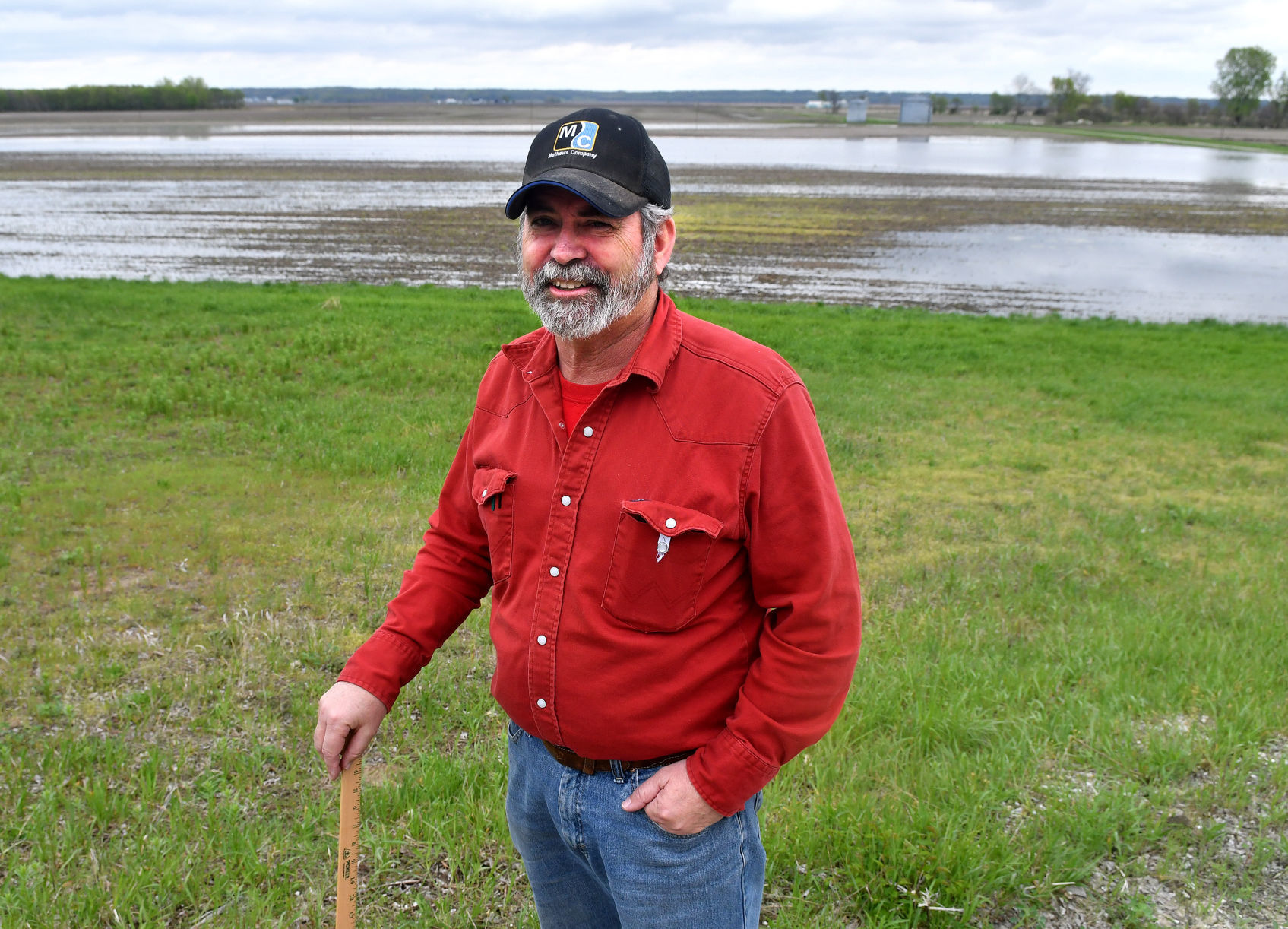 Farmers dealing with flooded fields.